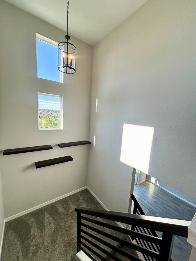 Building Photo - Impressive 4 Bedroom Townhome Nestled in M...