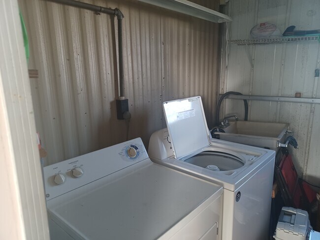 WASHER & DRYER IN SHED - 7325 Demure Ln