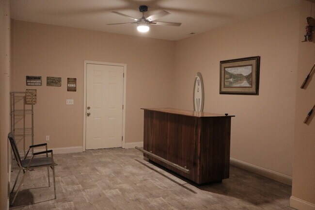 Building Photo - Expansive Mostly-Furnished Residence featuring 3 Bedrooms, a Completed Basement, and a Loft Space