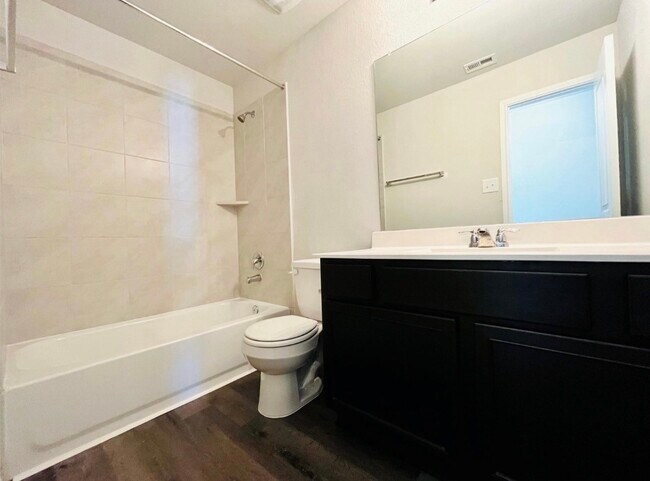 Building Photo - 4818 Blue Jacaranda Wy