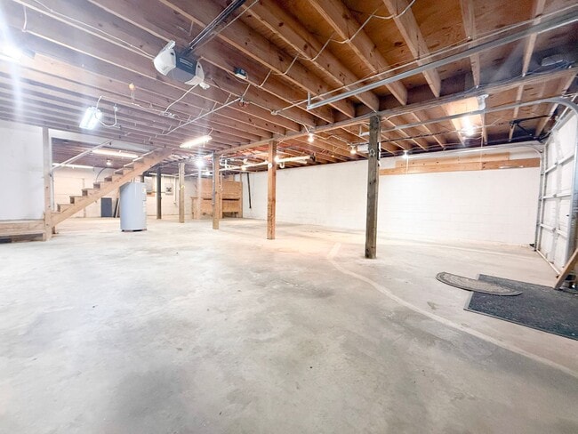 Building Photo - Spacious 3-Bedroom Home with Screened Porch, 2-Car Garage + Workshop