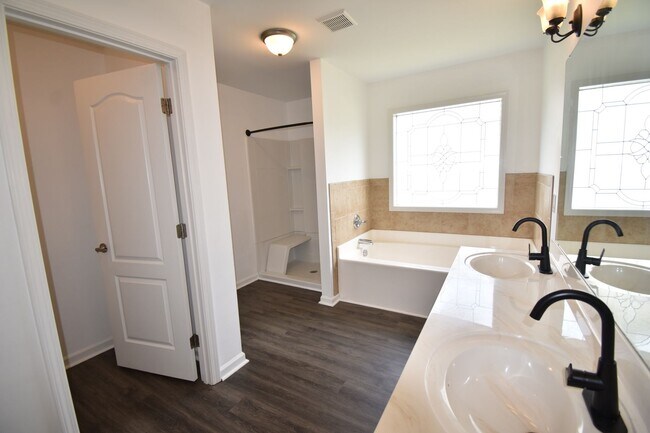 Building Photo - (Coming Soon)   4 Bedroom and 2.5 Bath Hom...