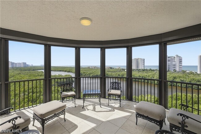 Building Photo - 8990 Bay Colony Dr