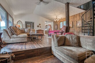 Building Photo - On the Blue River!  HUGE 4 Bedroom home, Furnished Updates throughout!  Bus route!  Spacious parking