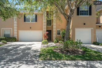 Building Photo - Beautiful 3-Bedroom Townhome in Gated Tamp...