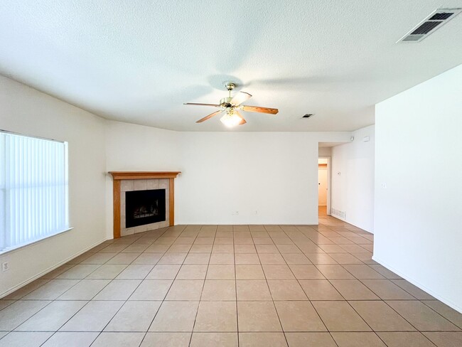 Building Photo - Available NOW!!!! Open floor plan features living room with fireplace, dining area, and large kit...