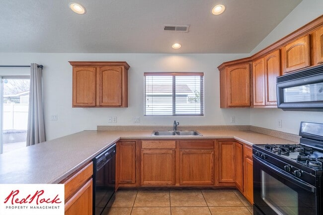 Building Photo - Move in Special: $200 off full first month rent on this inviting 3-Bedroom Home with Garage and P...