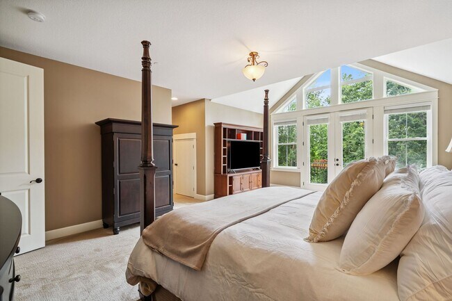 Building Photo - 2 Creeks Condominiums - Gated Community on...