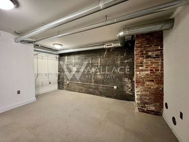 Building Photo - DOWNTOWN LIVING WITH PRIVATE GATED ENTRANC...