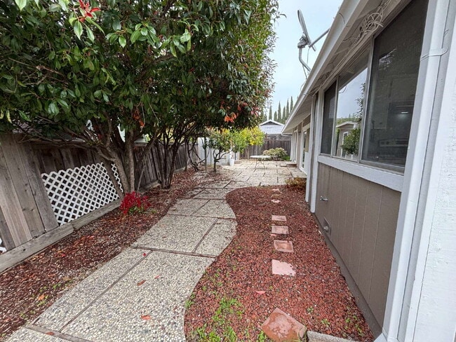 Building Photo - "Charming Concord Retreat: 3-Bedroom Gem with Granite Accents & Cozy Fireplace"