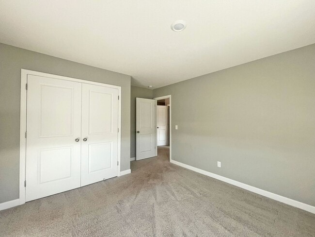 Building Photo - Sparkling Like-New 2-story w/ Full Walkout on Pond with Office-Bedroom 6, Pets OK!