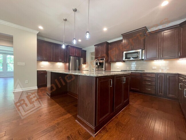 Building Photo - Gorgeous 5 Bedroom Home with First Floor In-law Suite & 3 Car Garage, Golf Course, Pool, Tennis a...