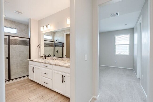 Building Photo - Amazing 4BR 2.5BA Home w/ 3-Car Tandem Garage • Pool Access • Yard w/ Fire Pit in Saguaro Trails