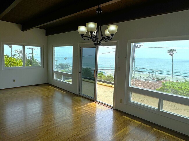 Building Photo - EXPANSIVE OCEAN VIEW from 2 balconies, VALUE Price in PDR