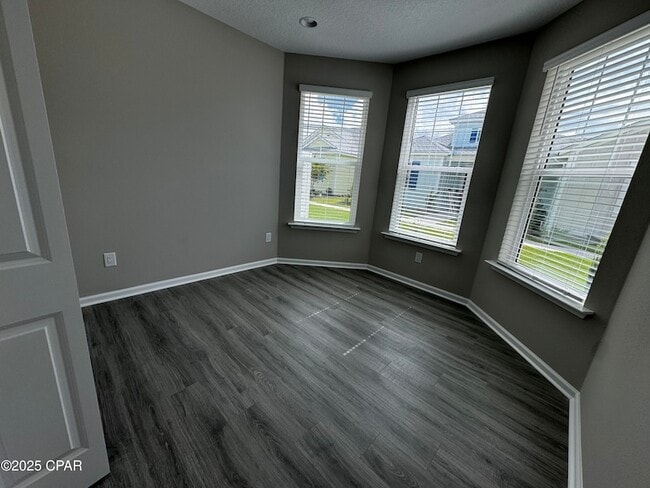 Building Photo - 9022 Parrot Pl