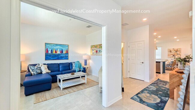 Building Photo - EXCEPTIONAL AND SPACIOUS FURNISHED TOWNHOME WITHIN WATERSIDE- NAUTIQUE!