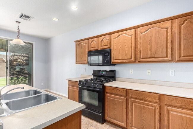 Building Photo - Coming Soon! Spacious Home & Yard with RV ...