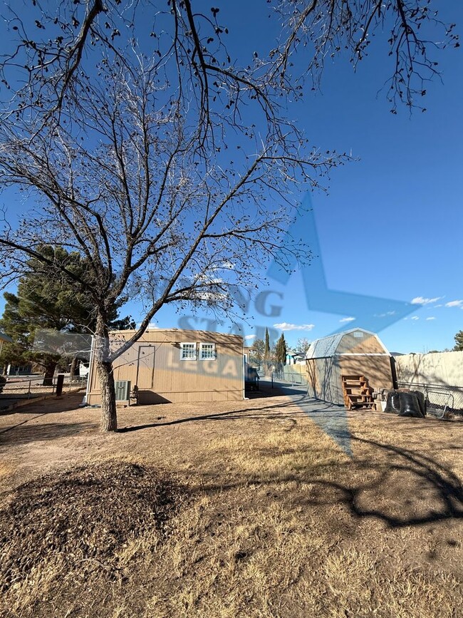 Building Photo - REDUCED! Updated, large lot, refrigerated ...