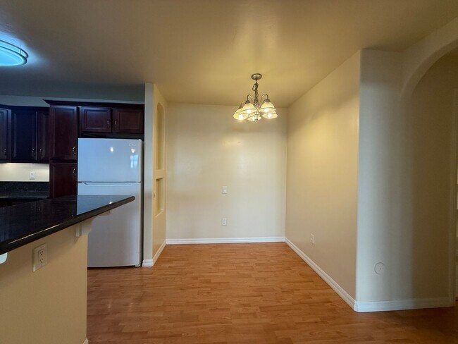 Building Photo - Upgraded Condo with Private Patio, AC, Pool, Gym, and Covered Parking in Gated Community