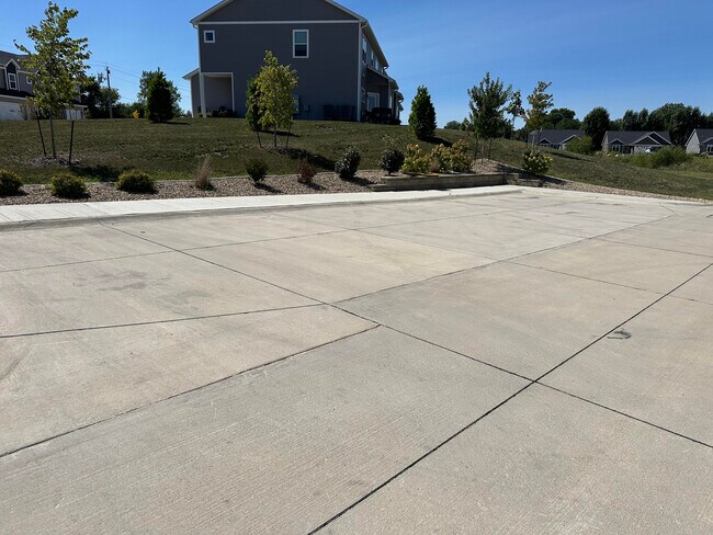 Extra parking across from unit - 4302 Spruce Creek Dr