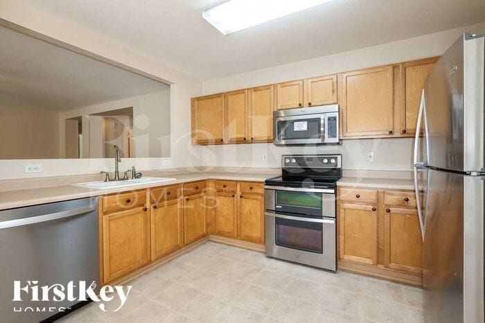 Building Photo - 15552 W Port Au Prince Ln