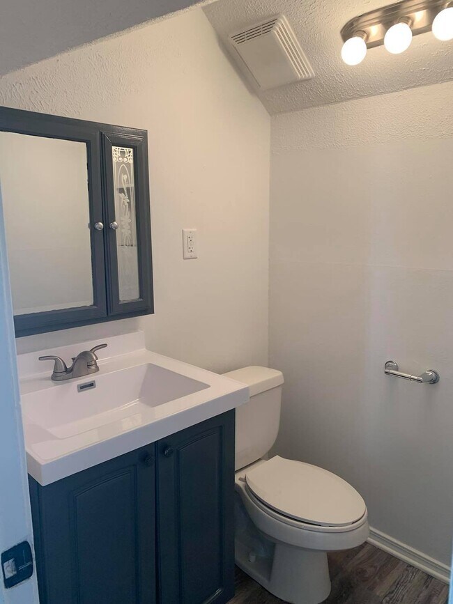 Bathroom (half)- Upstairs - 115 E 17th St