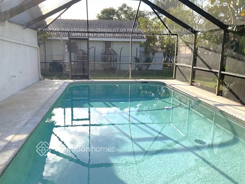 Building Photo - 8825 NW 57th Ct