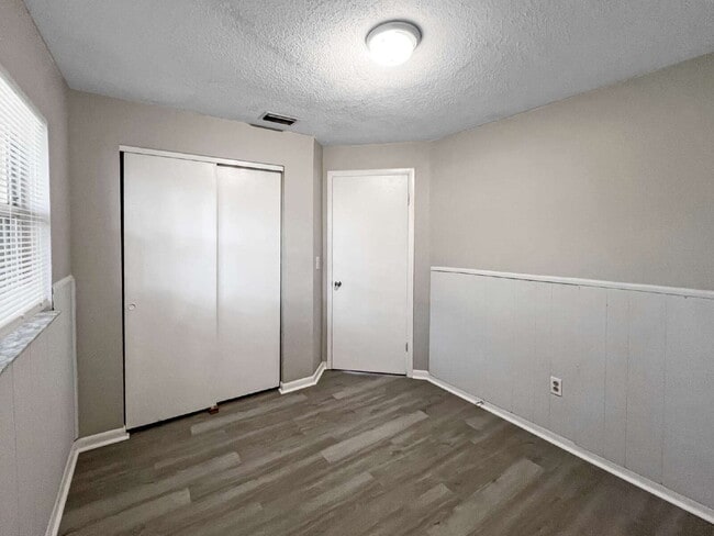 Building Photo - Budget-Friendly. Bold Personality. Big Coz...