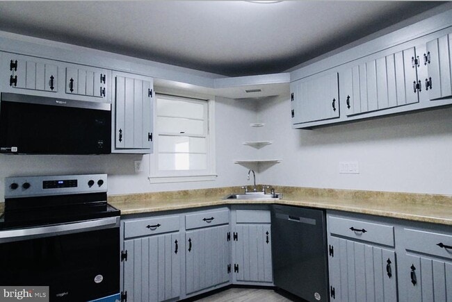 Building Photo - 412 Millwoof Dr