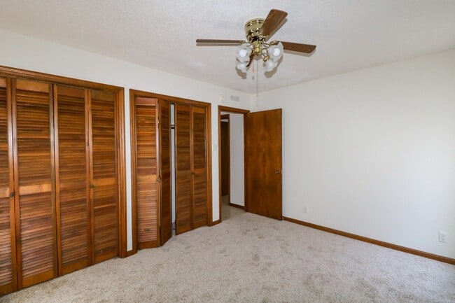 Building Photo - Two Bedroom, 2 Bath, 1-Car Garage, 1179 sq ft feet home with wood burning fireplace. and screened...