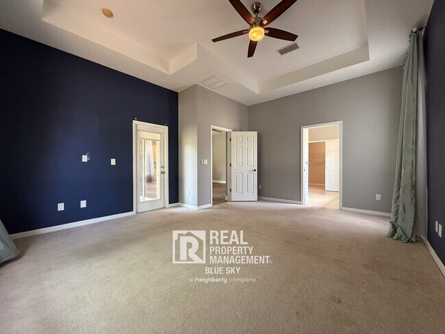 Building Photo - Executive Home with Custom Finishes in Gat...
