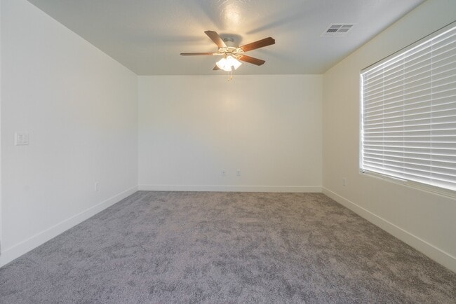 Building Photo - Modern 4-Bed Stand-Alone Home with Fenced Patio