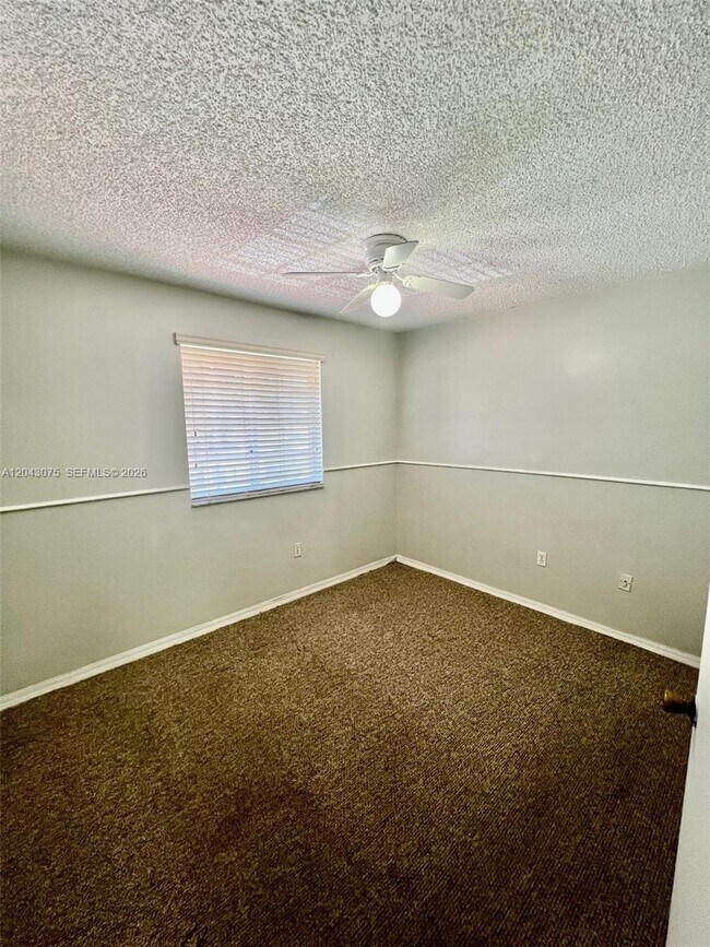 Building Photo - 6975 NW 173rd Dr