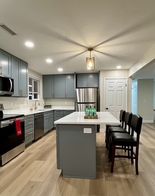 Kitchen with large island - 2455 E Woodchuck Way