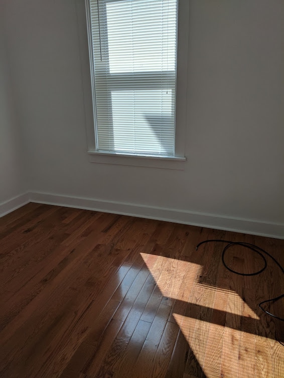 Building Photo - Check out this Totally Updated First Floor Duplex! 2BR+Den