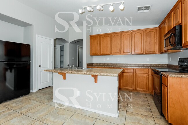 Building Photo - Lease today! No extra charge for contentme...