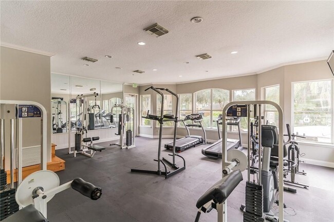 Building Photo - Seurat Street, Orlando, FL 32819 - 4 BR 2 BA condo