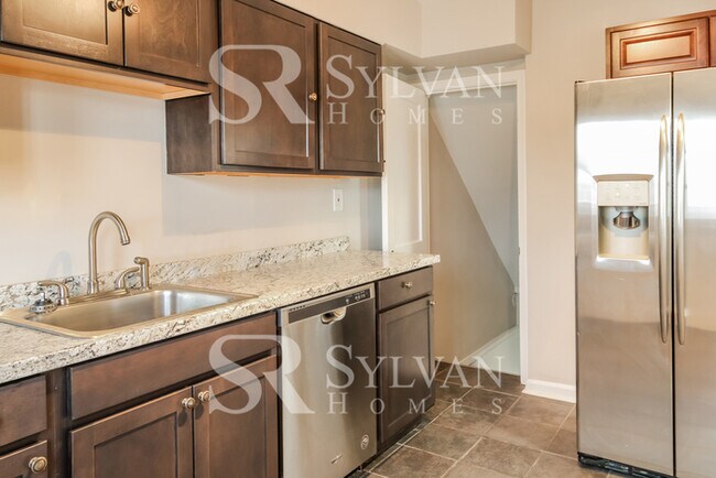 Building Photo - Turn the key. Enter. Smile. Repeat every day!