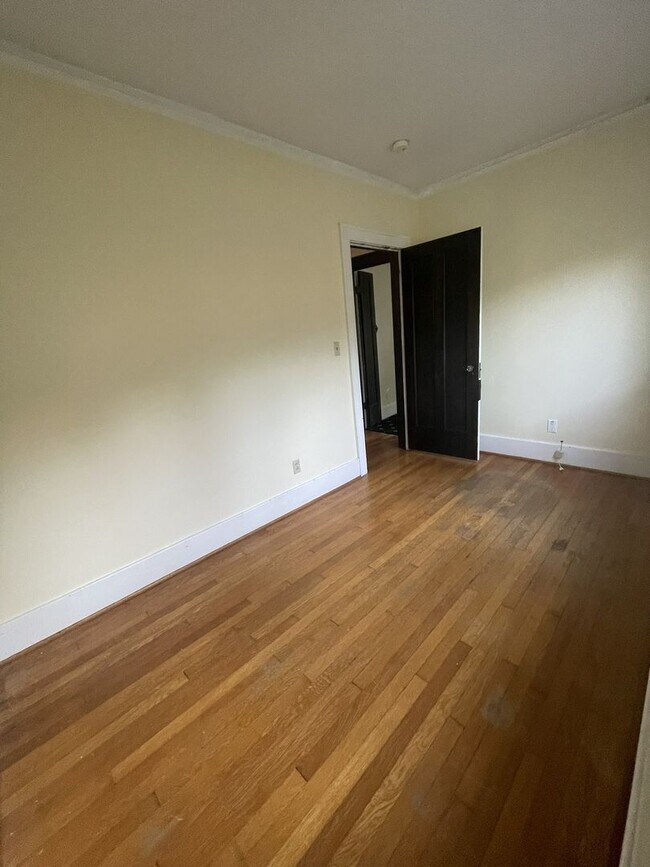 Building Photo - One Block to the Diag! Charming Home with Private Courtyard + Parking