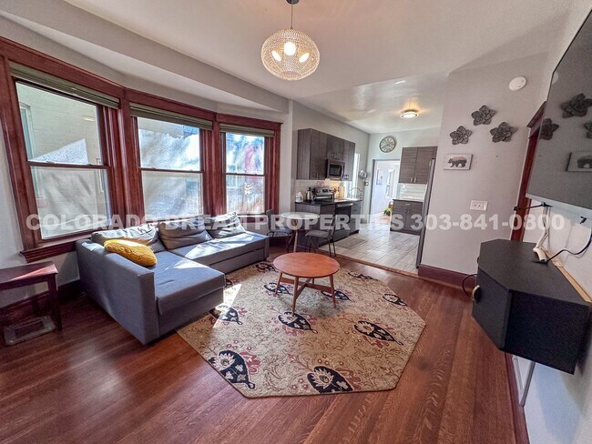 Building Photo - A home where old-world charm meets modern sophistication!