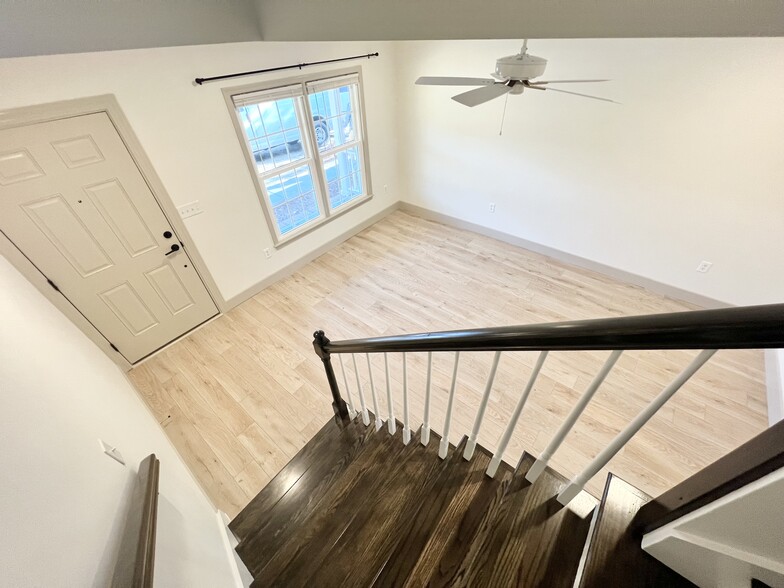 Living Room/Entry - View from Stairwell - 1 Commercial Row