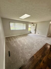 Building Photo - Updated 3BR Brick Ranch | Screened Porch | Attached Garage