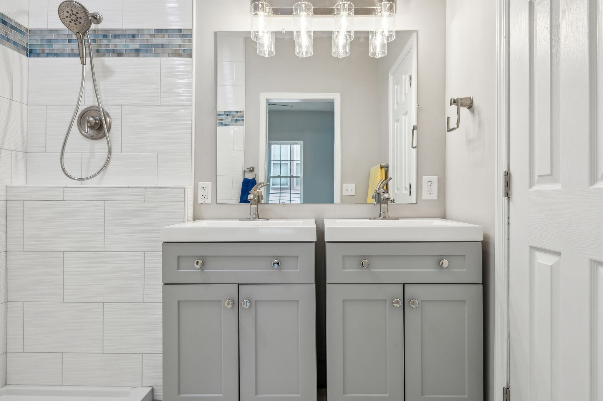 Ensuite bathroom with a large, custom, spacious shower, two vanities and a water closet - 2301 Seifried St