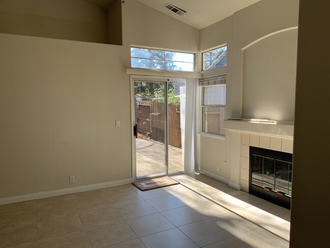 great room with fireplace, tile flooring - 2480 Julliard Cir