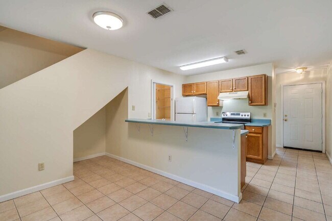 Building Photo - 1 bedroom and 1 bathroom in a 3x3 duplex STEPS AWAY FROM CAMPUS
