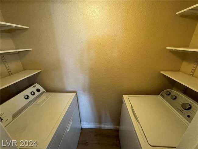 Building Photo - Modern 2-Bed Condo with Fireplace, Balcony & Designer Touches!