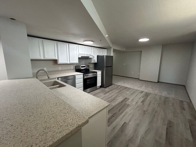 Building Photo - Solid surface countertops, stainless steel...
