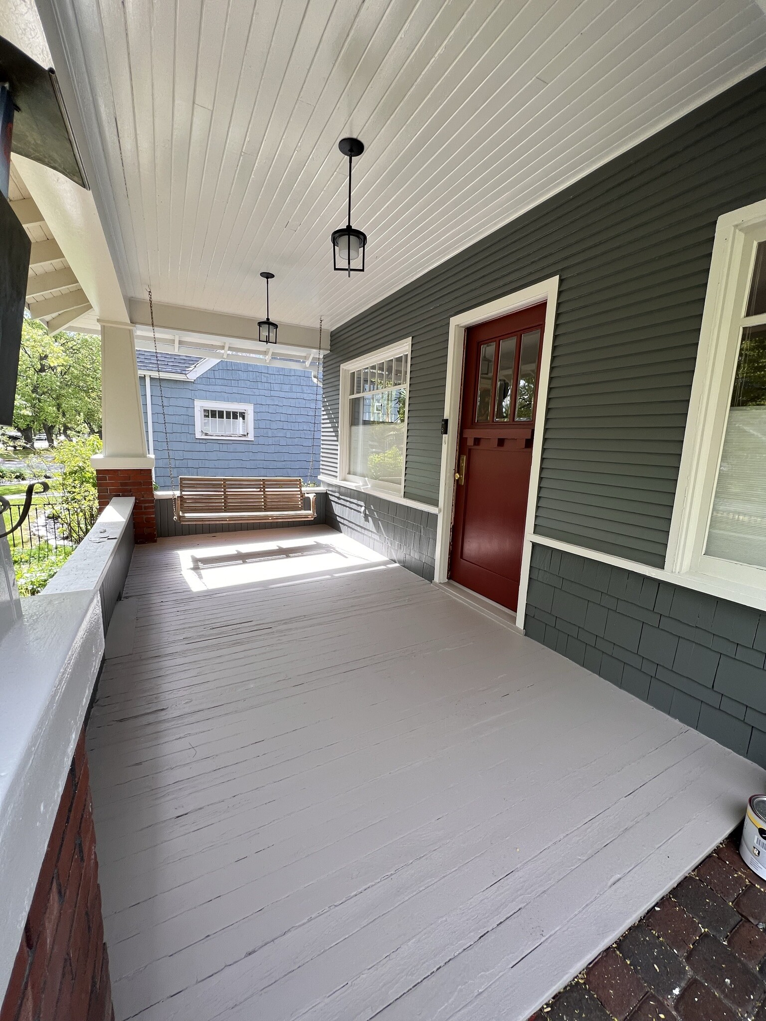 front porch and wooden swing - 508 Daly Ave