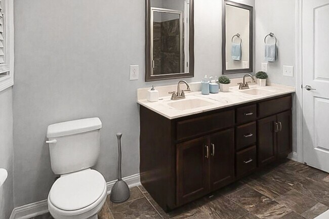 Building Photo - Pet Friendly Three Bedroom with Bonus!