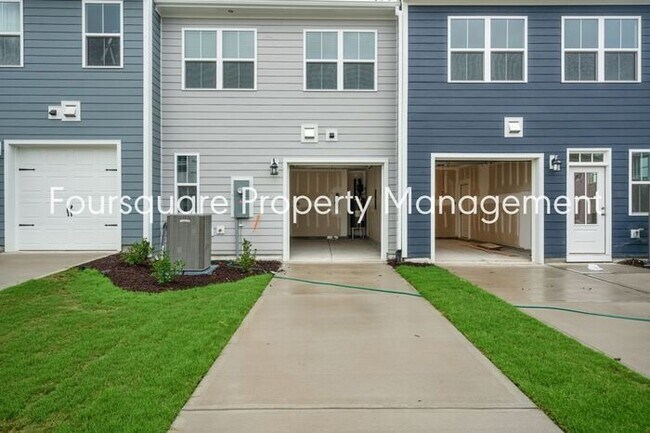 Building Photo - Spacious 3-Bed / 2.5-Bath Townhome with First-Floor Den, Hardwood Floors & 1-Car Garage – Wendell...